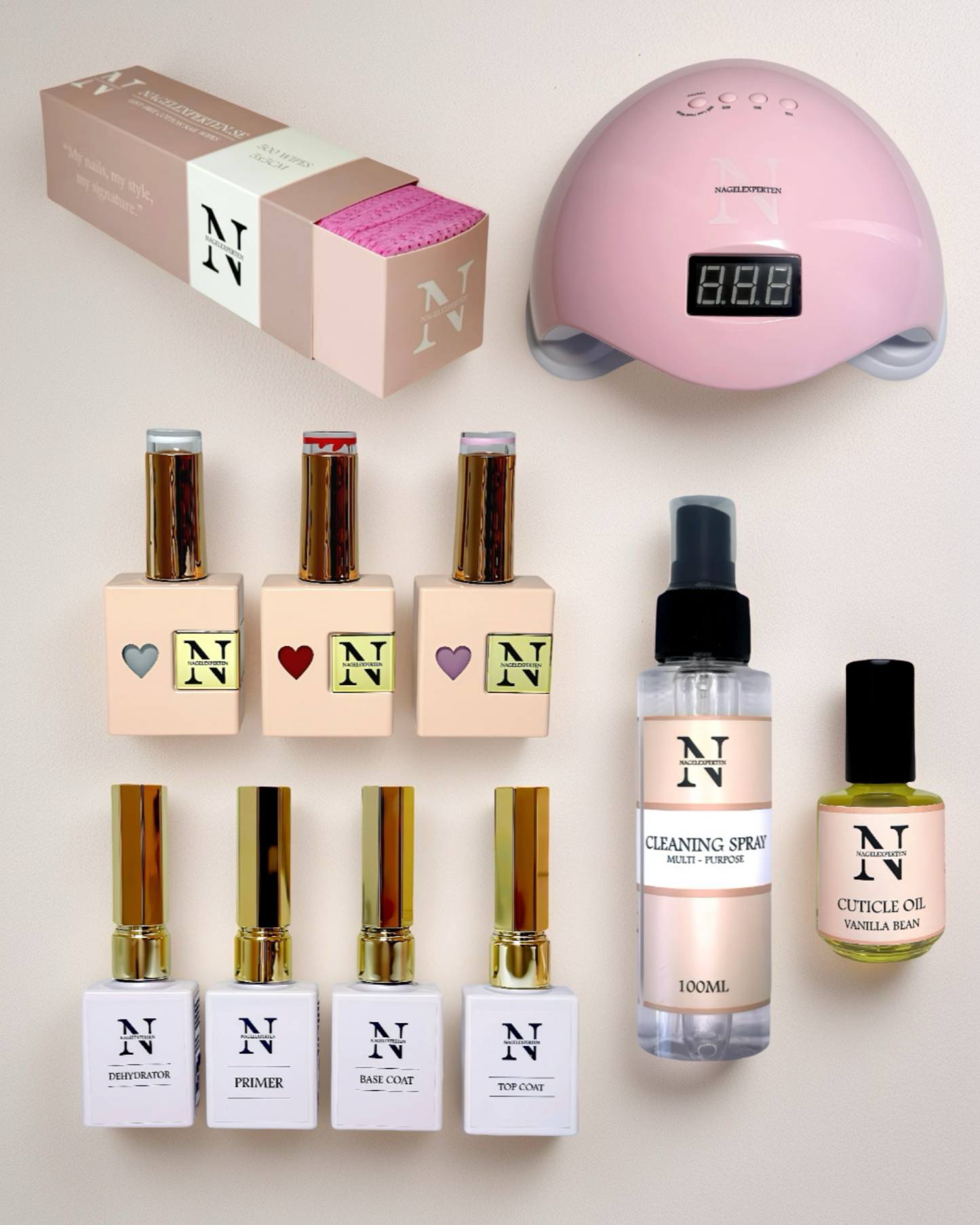 Gellack startkit med rosa UV-lampa, gellack, base coat och top coat.