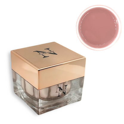 Fyrkantig builder gel burk med guldigt lock som det står Nagelexperten på. Ovanför är en rund cirkel som visar att färgen innehåller beige nagel gel.