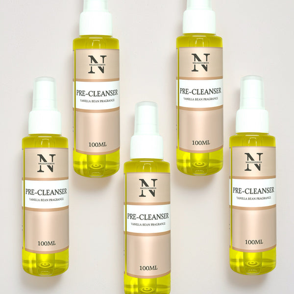 5 gula flaskor från Nagelexperten med vitt spraymunstycke innehållande rengöring för naglar.